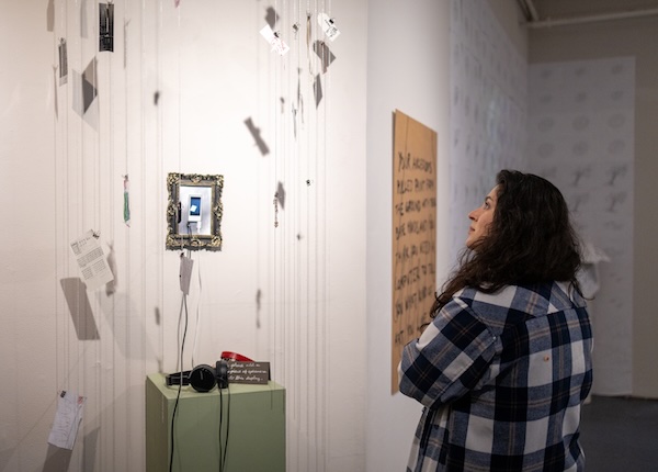 Artist painting in studio at Artspace