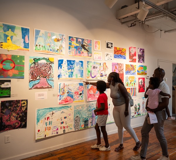 Family exploring Artspace galleries