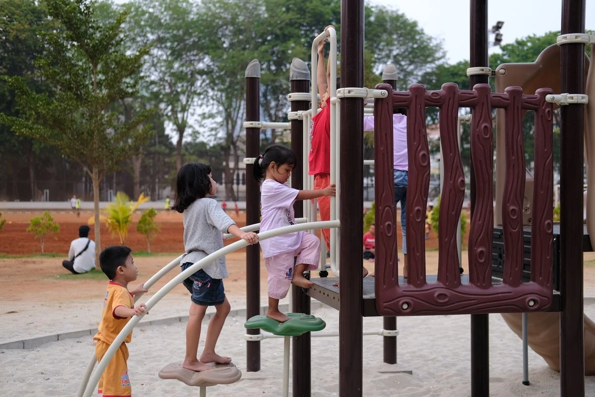 Kids playing at a park in Raleigh